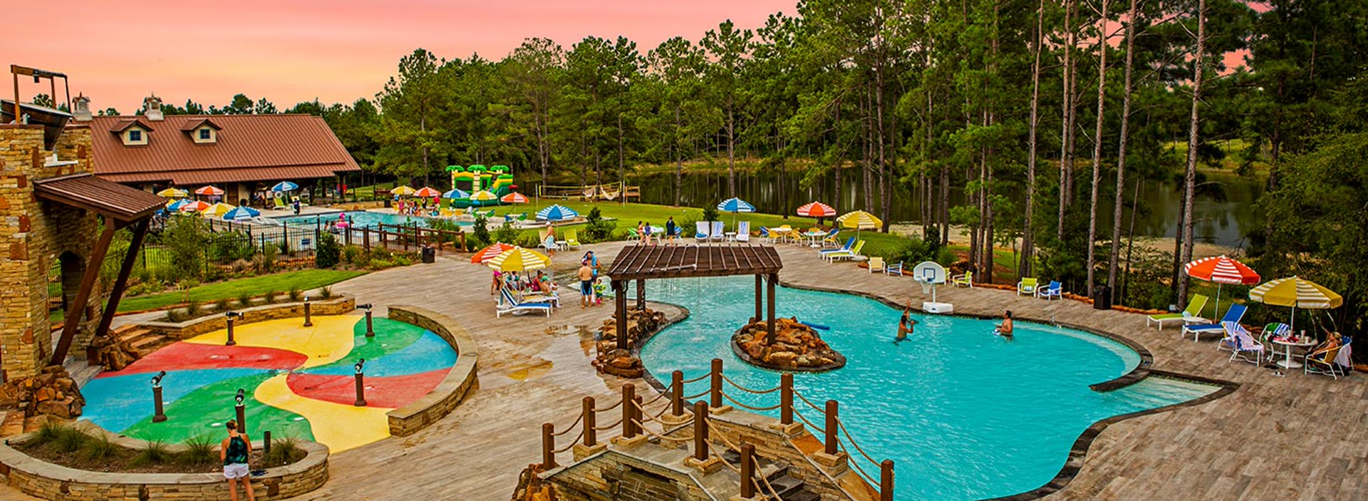 Bluejack National amenity complex — The Fort, featuring pools, water slide, and sporting facilities